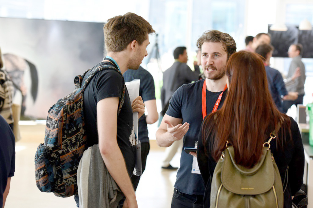  BA Games Art student Jack Hanna talking to Animation Director Dan Cripps & Lead Compositor Elena Fiorin 